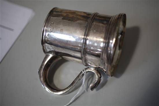 A George I Brittania standard provincial silver mug by John Elston, 5 oz.